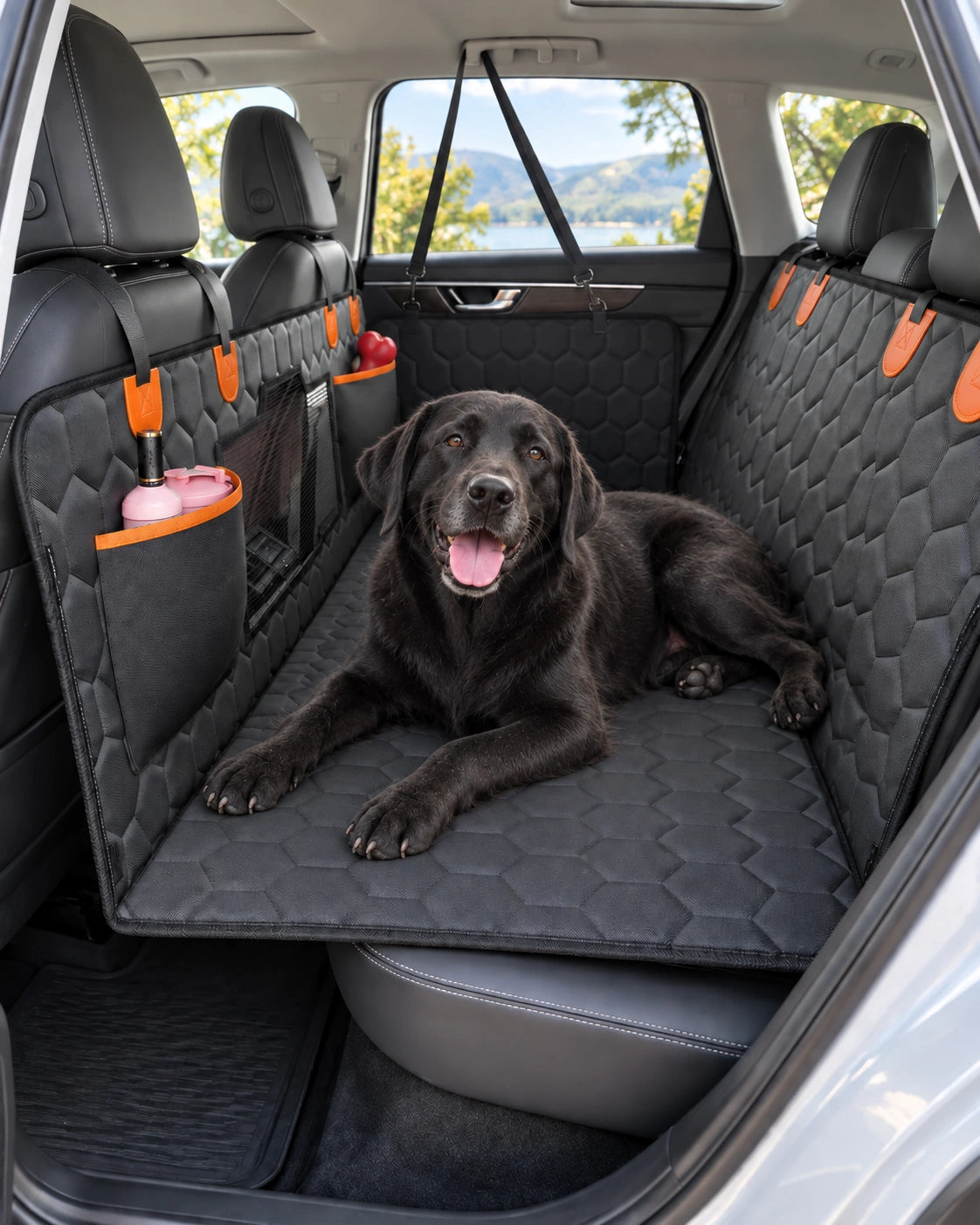 Black Labrador on a RoadNest backseat extender installed in a car